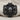 Pirate Crossbones Skull Ring, black rhodium, front view on textile fabric