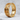 Geometric Pattern Ring, gold vermeil, angled view on textured stone