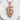 Rod of Asclepius Pendant, rose gold, front view on stone
