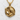 Detailed view of handcrafted gold raven book pendant medallion resting on white textured background surface