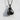Tied Boxing Gloves Pendant, black rhodium, product photo against textured wall