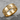 Lux E Tenebris Ring, gold vermeil, product photo on stone base