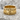 Si Vis Pacem Swords Ring in gold vermeil, front view on stone surface