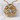 Witches Knot Pendant, gold vermeil, product photo on textured surface