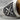 Artillery Tiger Eye Ring, oxidized silver, close-up of crossed cannons emblem