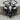 Elephant Head Pendant, black rhodium plated, front view on wood