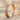 Celtic Heart Knot Ring, rose gold, product photo on sand