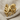 Kraken octopus ring, gold vermeil, front view on fabric