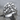 Skull Pile Signet Ring, polished silver, front view on stone