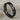 Eternity interlinked heart ring in black rhodium plated silver, angled front view