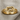 Infinity Knot Loop Ring, gold vermeil, front view on linen