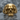 Baroque Fanged Skull Ring, polished silver finish, front view on wet rock