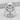 Atlas Rise Ring, polished silver, front view on stone surface