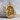 Chiseled Self-Made Man Pendant in gold vermeil, front view on textured stone