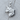 Fox Head Pendant, polished, side profile view on wood surface