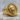 Meander Lion Ring, gold vermeil, product photo on stone