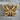 Folded Wing Butterfly Pendant, gold vermeil, product photo on stone