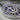 Khanda Blue Enamel Pendant, oxidized silver, close-up of relief and enamel