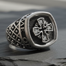 Side profile of silver signet ring displaying intricate quilted lattice texture and oxidized finish