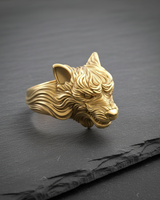 Detailed wolf ring featuring intricate fur texture and fierce expression on black stone background