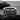 Detailed view of the 925 sterling silver infinity love ring resting on dark slate, showcasing the engraved love lettering.