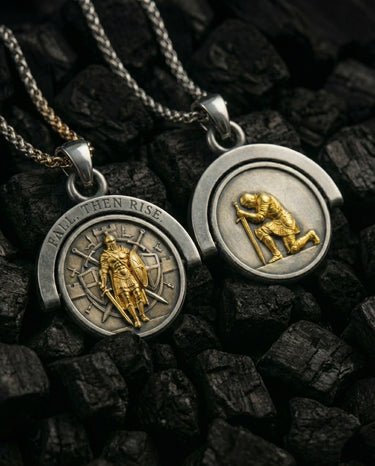 Comparison of gold and silver spinning knight pendants displayed on dark textured surface
