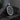 Oxidized 925 sterling silver skeleton lovers pendant featuring two skeletons sitting on textured background on dark rock