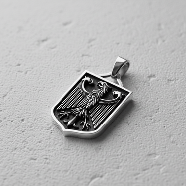 Angled view of silver Bundesadler pendant highlighting thick bail and polished edges