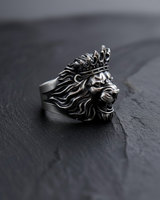 Side profile of silver lion ring showing oxidized finish and intricate crown details for men's fashion jewelry