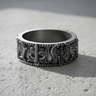 Silver guardian knight ring featuring winged warrior and helmet designs on grey background