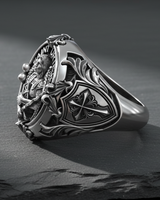 Side profile of handcrafted religious ring displaying Saint Uriel lettering and intricate cross shield detail