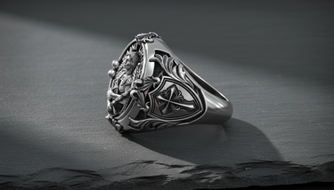 Side profile of handcrafted religious ring displaying Saint Uriel lettering and intricate cross shield detail