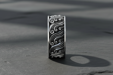 Front view of wide band sterling silver ring with detailed swirling ocean water design for nature lovers