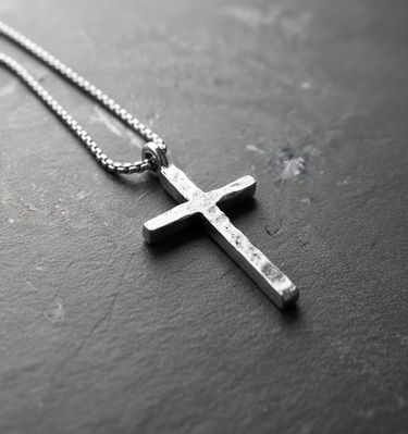 925 sterling silver rustic cross pendant for men with distressed finish on dark grey background