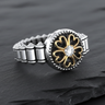 Elegant 925 sterling silver clover ring featuring a gold-outlined four-leaf design and central stone on dark background