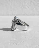 Side profile of polished 925 sterling silver Ankh ring showing thick band and pave setting construction