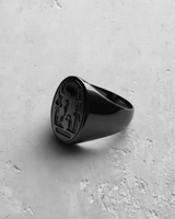 Dark oxidized finish silver Akhenaten ring displaying detailed pharaoh and Aten sun disk motif engraving