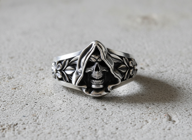 Front view of 925 sterling silver skull ring featuring a hooded grim reaper design