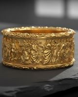 Gold vermeil Keys of Heaven ring featuring Jesus and St Peter relief on textured grey background