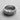 Angled perspective of the handcrafted Silver Mountain Ring, showing the detailed rugged surface and smooth interior band.