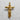 Studio shot of Jesus crucifix pendant available in gold vermeil and silver finishes on textured background