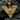 Close-up macro view of the gold eagle pendant resting on a dark stone background highlighting intricate feathers