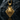 Front view of the Alien Xenomorph pendant highlighting the smooth dome and textured elements on a dark stone surface