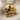 Cracked Skull Ring, gold vermeil, angled side view on linen