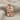 Queen of Hearts Pendant, rose gold, front view on fabric