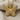 Feather Wing Butterfly Pendant, gold vermeil, front view on fabric