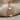 Anchor Helm Pendant, rose gold, front view on fabric