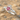 Pink Heart Claddagh Ring, polished silver on sand