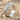 Wood Branch Ring, polished, product view resting upright in sand