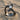 Serpent Gemstone Ring, black rhodium plated finish on beach sand